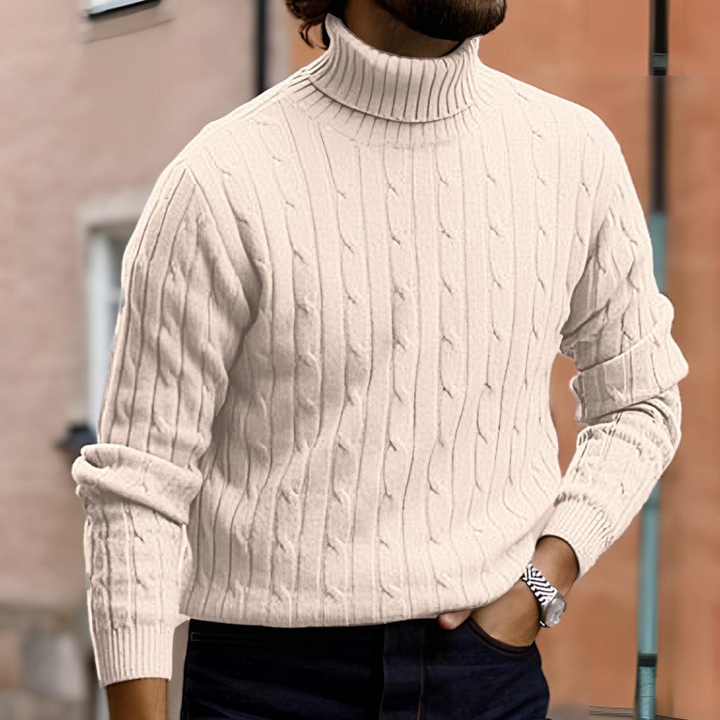 White cable-knit turtleneck sweater with long sleeves and ribbed cuffs