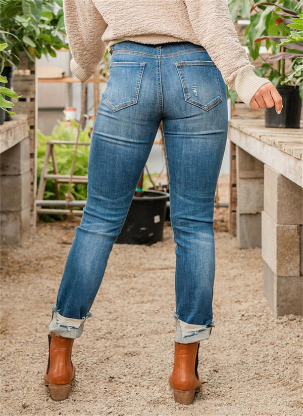 Slim Fit And Torn Blue Jeans For Women - WOMONA.COM