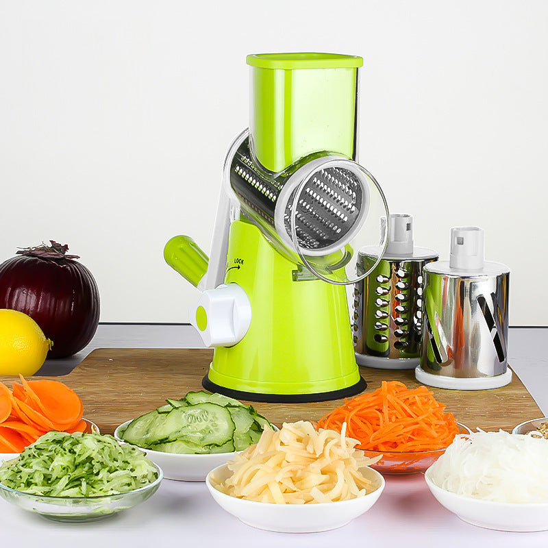 Green vegetable chopper with grater drum and shredding container, with veggie bowls