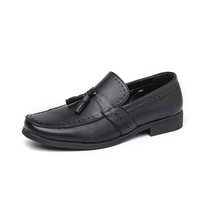 Black round-toe leather loafer shoes with tassel detail and low-profile sole