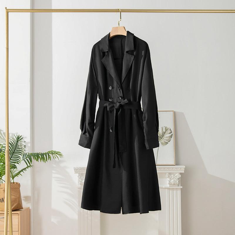 Women’s black mid-length trench coat with tie belt and notch lapels