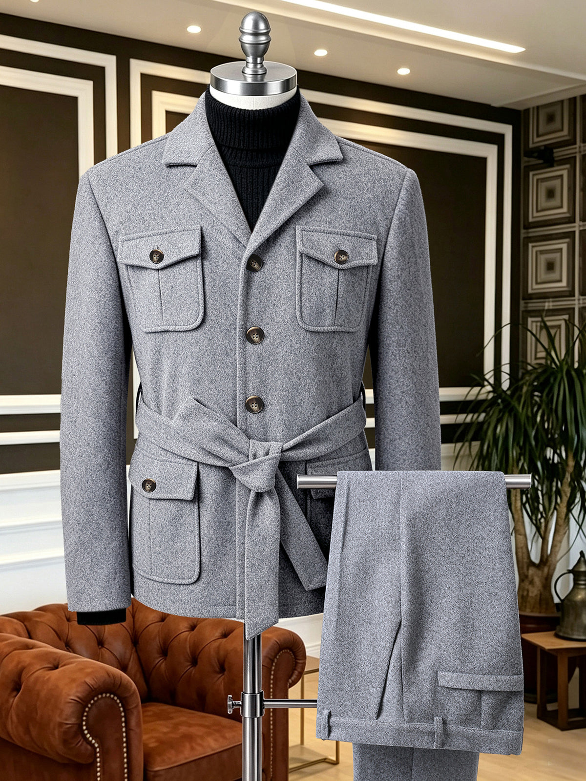 Gray coat on mannequin, tied waist and multiple flap pockets