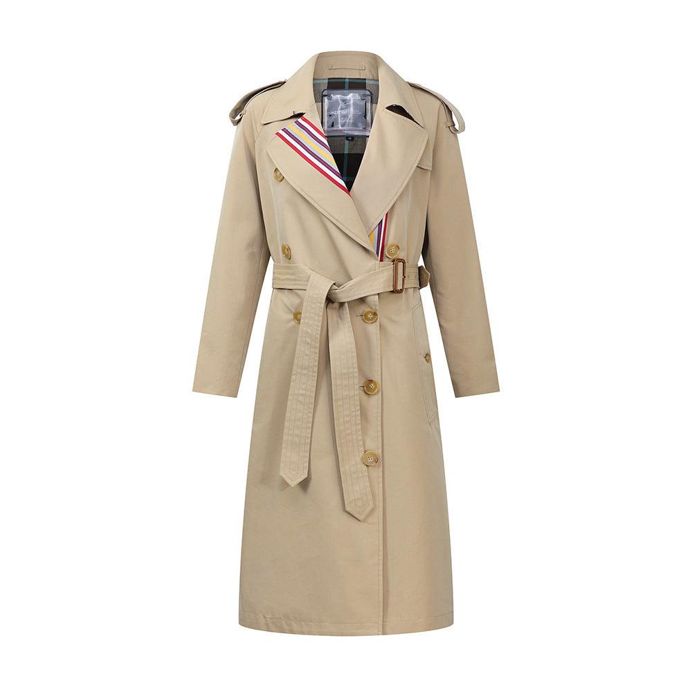 Honey double-breasted trench coat with color-stripe detail, belt, and gold buttons