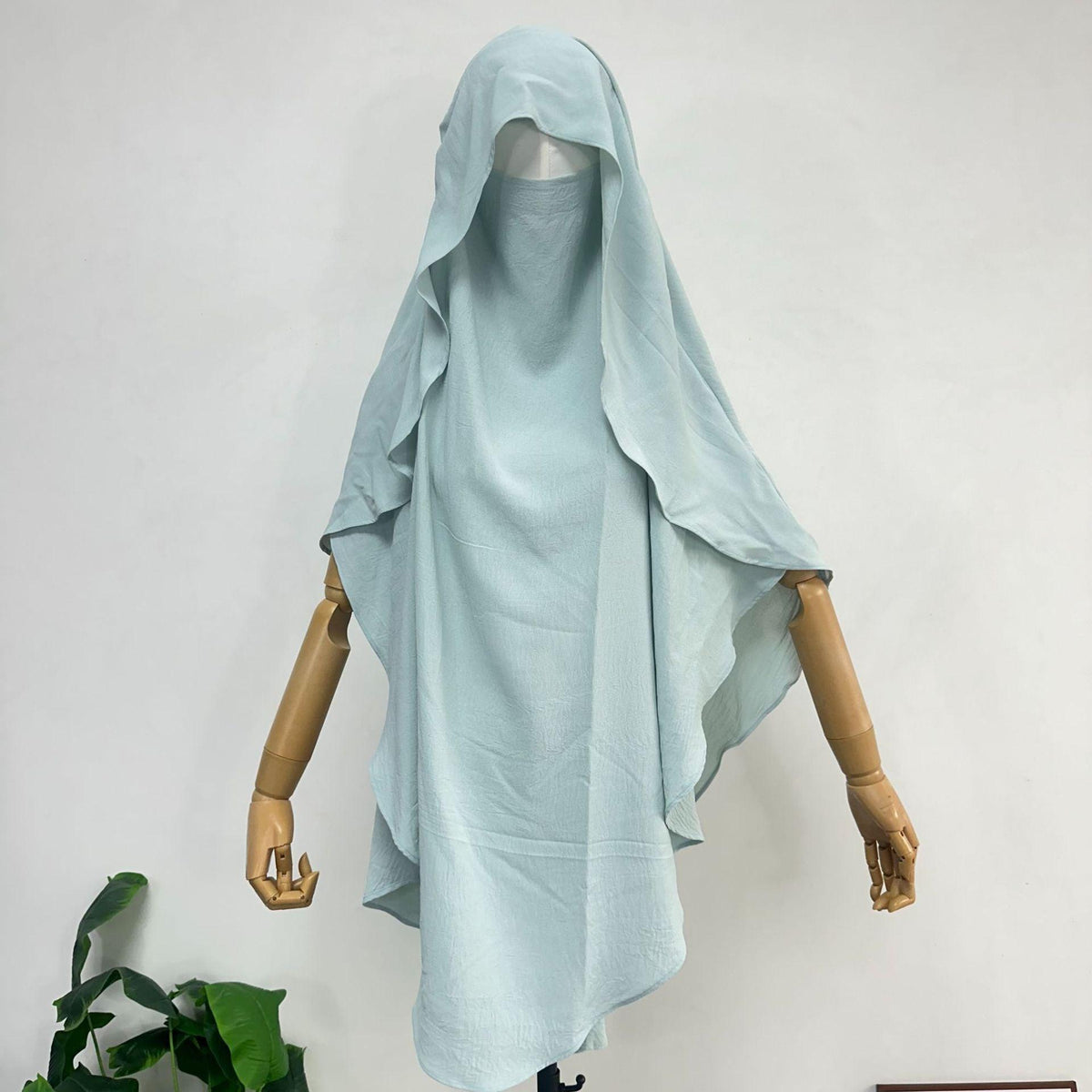 Women’s polyester scarf shawl, pale blue hood with layered flowing fabric sides