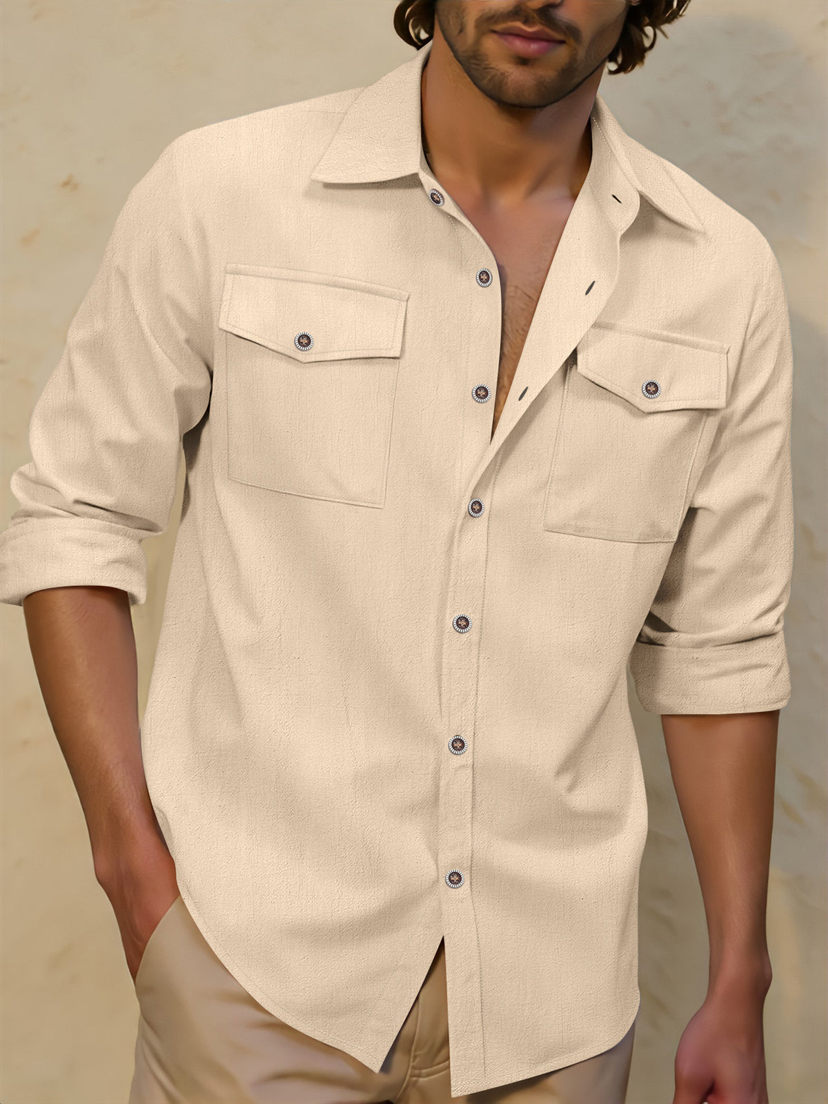 Light apricot loose-fit button-up shirt with lapel collar and two chest pockets