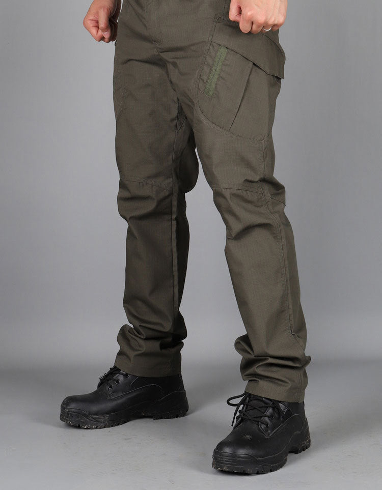 Olive-brown tactical cargo trousers with side cargo pockets and reinforced knees