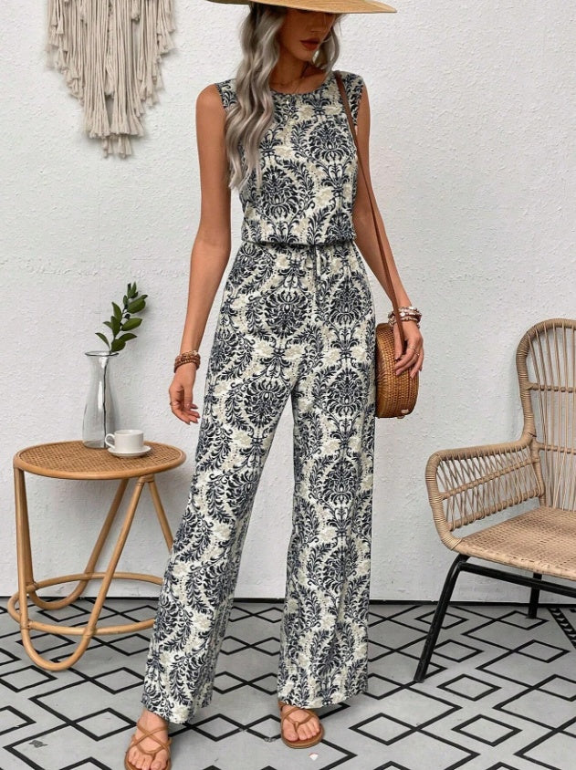 Dark blue printed two-piece set with sleeveless top and waist-cinching straight-leg pants