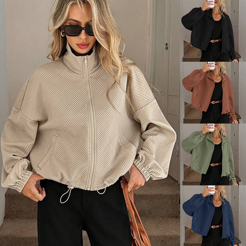Women’s zip-up high-collar jacket in light cream with diamond pattern, zipper and drawstring hem