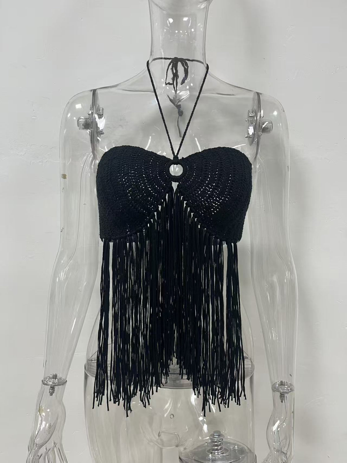 Women’s halter-neck tube top in black with sweetheart knit cups and tassel fringe
