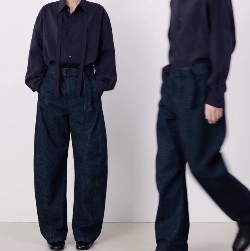 Wide-leg dark blue denim jeans with adjustable waist belt
