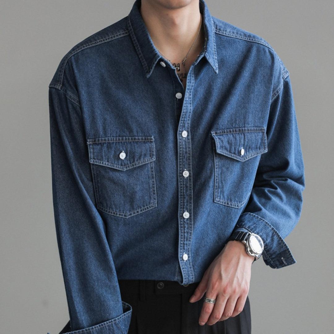 Men's loose dark blue denim long-sleeve shirt with button front and chest pockets