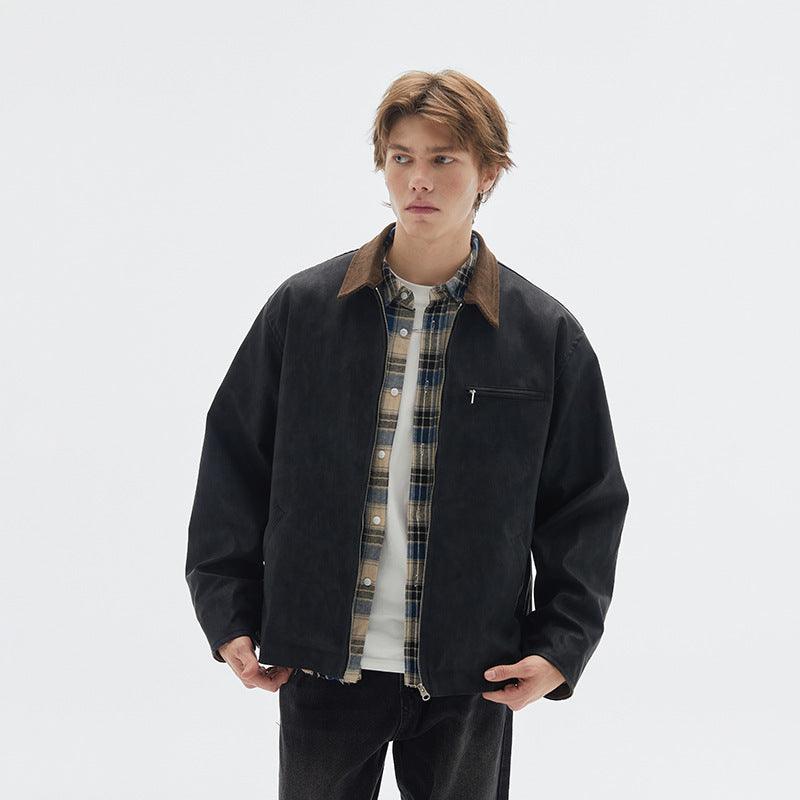 Men's black retro-style jacket with zip front, stand collar, and chest pocket.