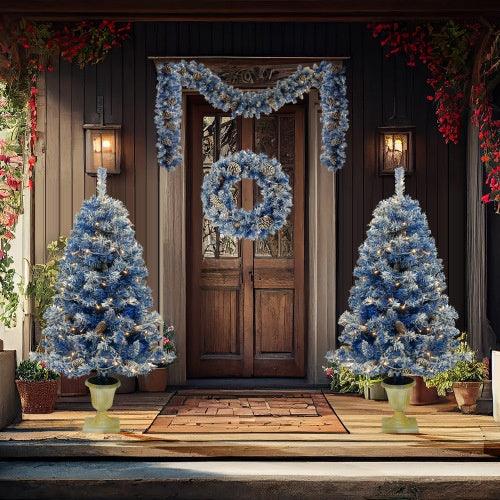 Artificial pre-lit blue Christmas tree set with two decorated flocked trees