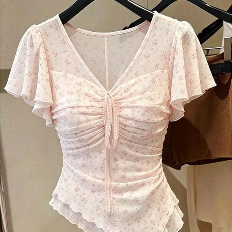 Pink printed ruched V-neck short-sleeve dress with flutter sleeves and lace-up center