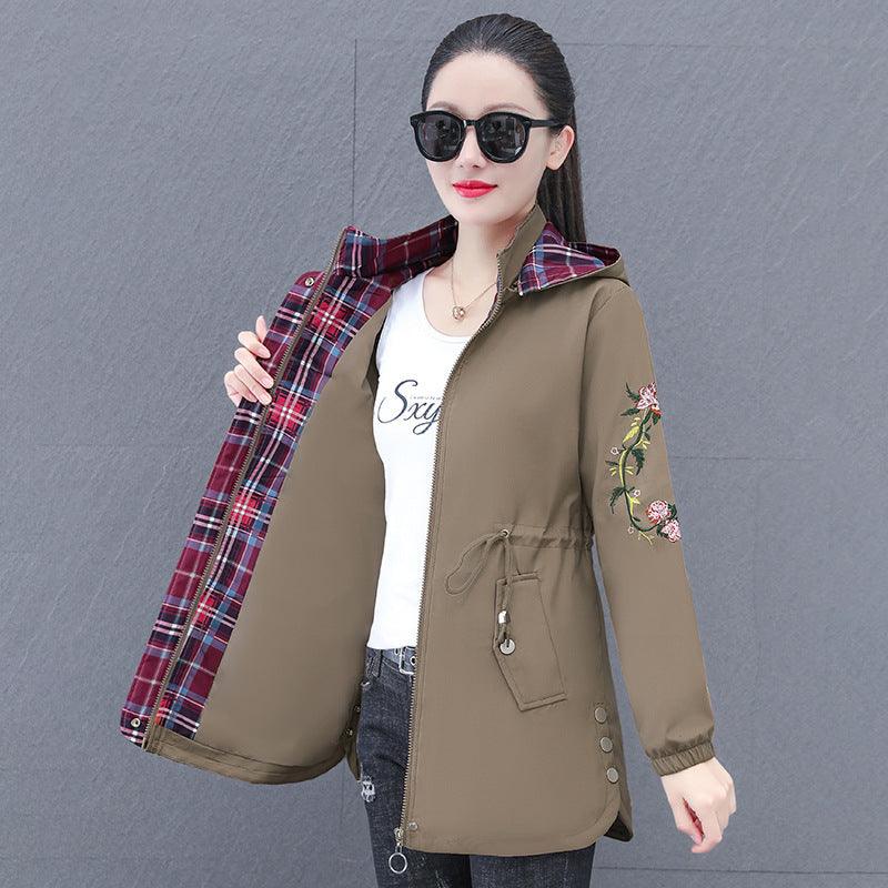 Women's hooded mid-length trench coat in khaki with drawstring hem and floral sleeve embroidery