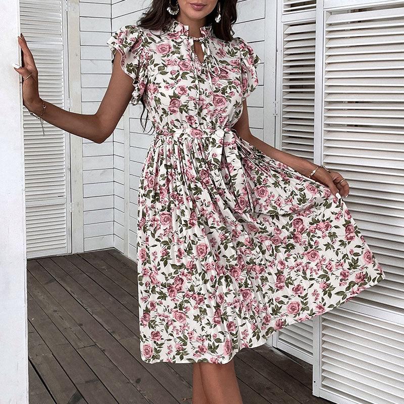 Floral midi dress with ruffled cap sleeves and gathered waist, white with pink rose print