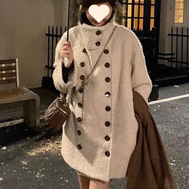Apricot fuzzy mid-length jacket with black buttons and buttoned flap pockets