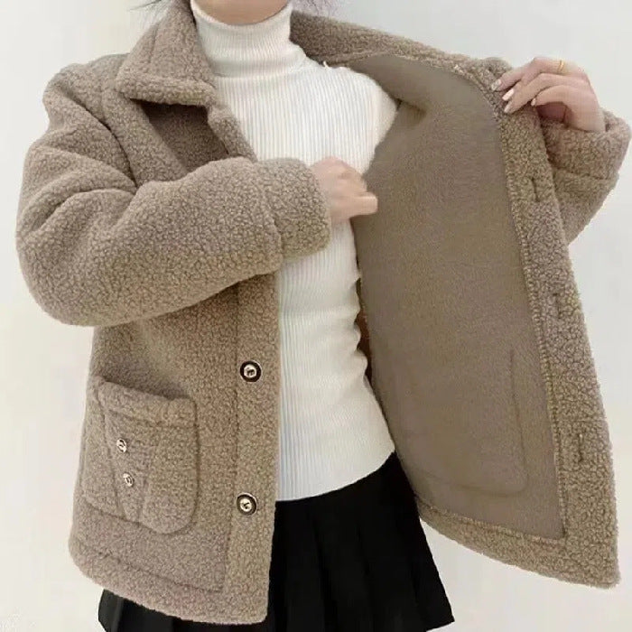 Camel fleece-lined mid-length fur coat with button front and flap pockets, open front view