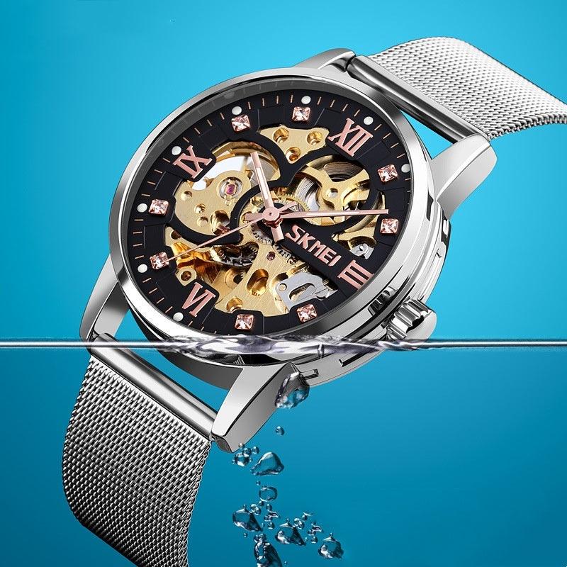 Men's mechanical skeleton watch with black dial, Roman numerals, silver mesh band