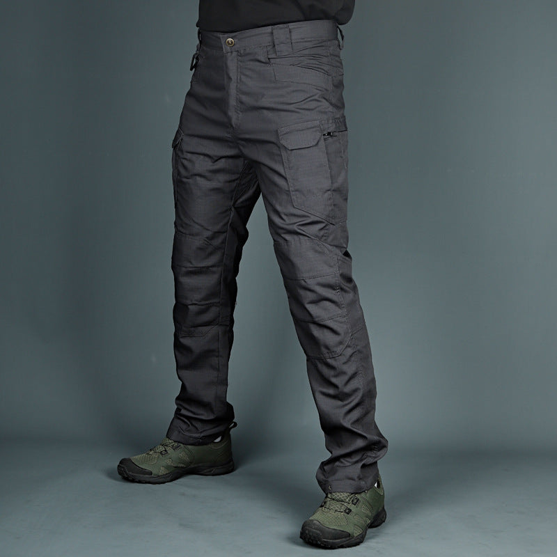 Dark gray tactical cargo pants with belt loops and stacked cargo pocket details
