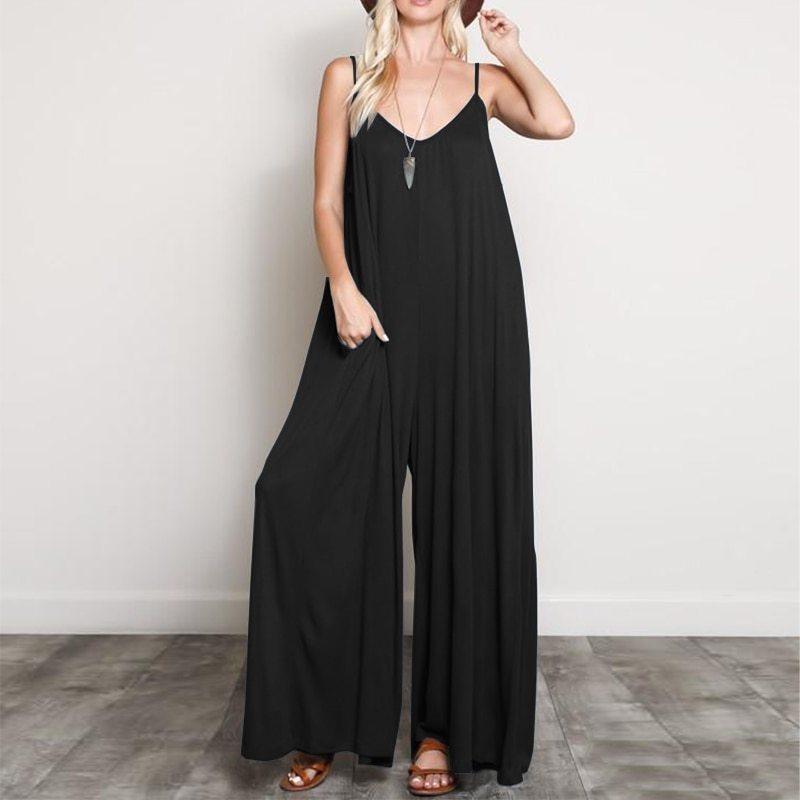 Black V-neck sleeveless long jumpsuit with wide legs and spaghetti straps.