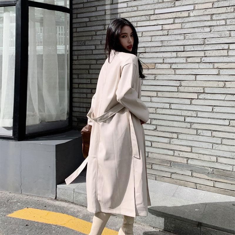 Cream PU leather windbreaker coat with belt tie and button front