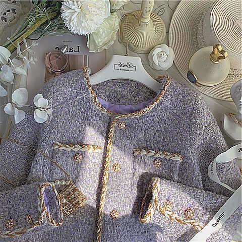 Women’s tweed short coat with rounded collar, gold trim, and embellished patch pockets