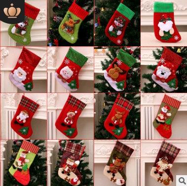 Christmas stocking with Santa Claus face, white beard, and “Merry Christmas” lettering