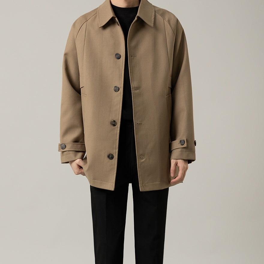 Men's loose mid-length lapel jacket in khaki with button front and cuff tabs