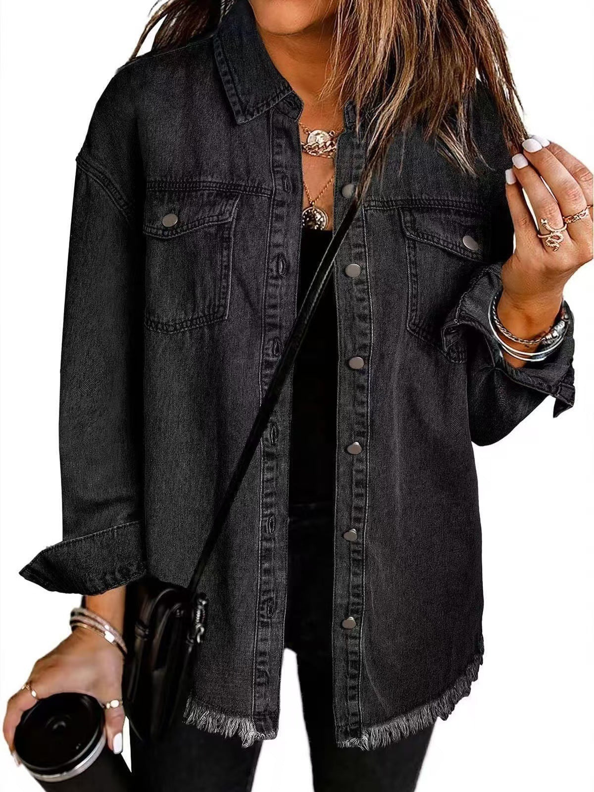 Washed denim shirt jacket in dark black, button-front with chest flap pockets and frayed hem