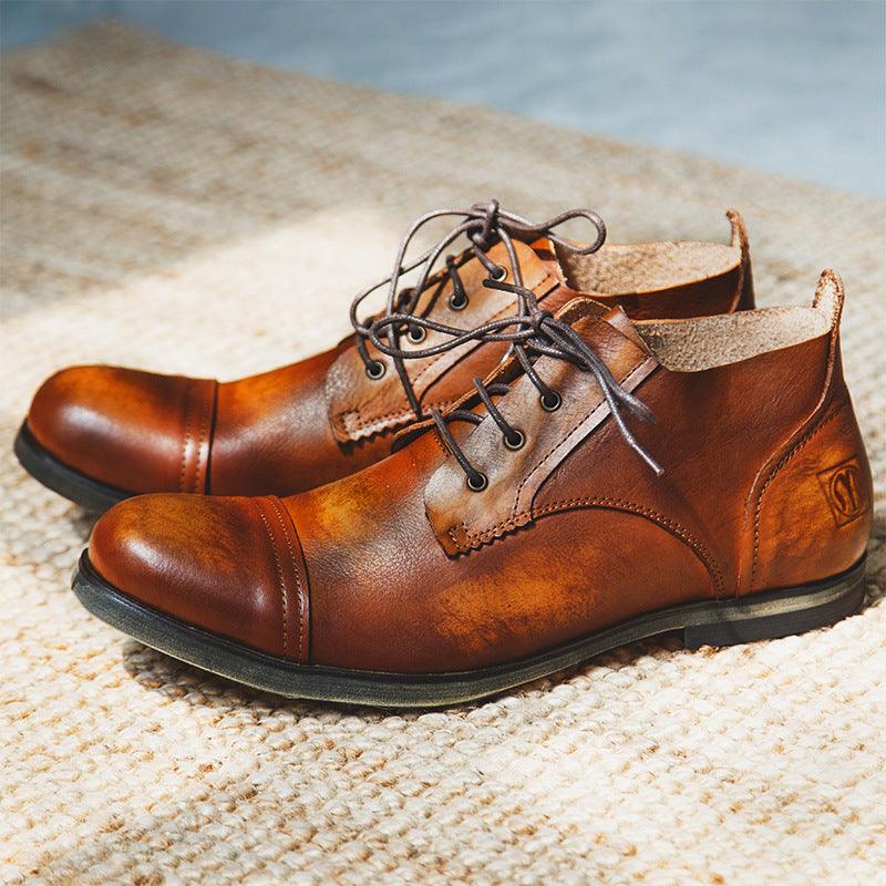 Brown leather lace-up casual boots with cap toe, dark rubber sole, metal eyelets