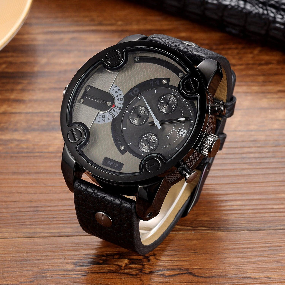 Men's quartz wrist watch with black case, gray dial, and black leather strap