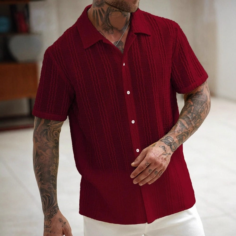 Wine red striped short-sleeve button-up shirt with pointed collar and vertical texture.