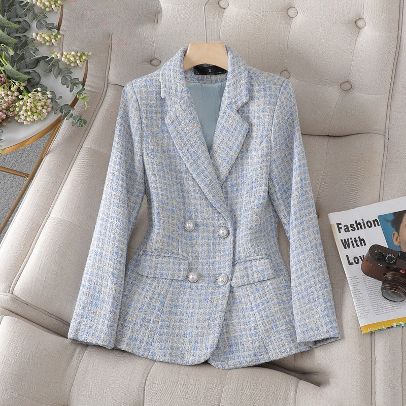 Light blue tweed blazer with peak lapels and double-button front