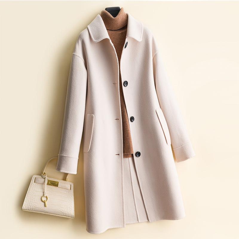 Light cream mid-length wool-blend trench coat with notched lapels and button front