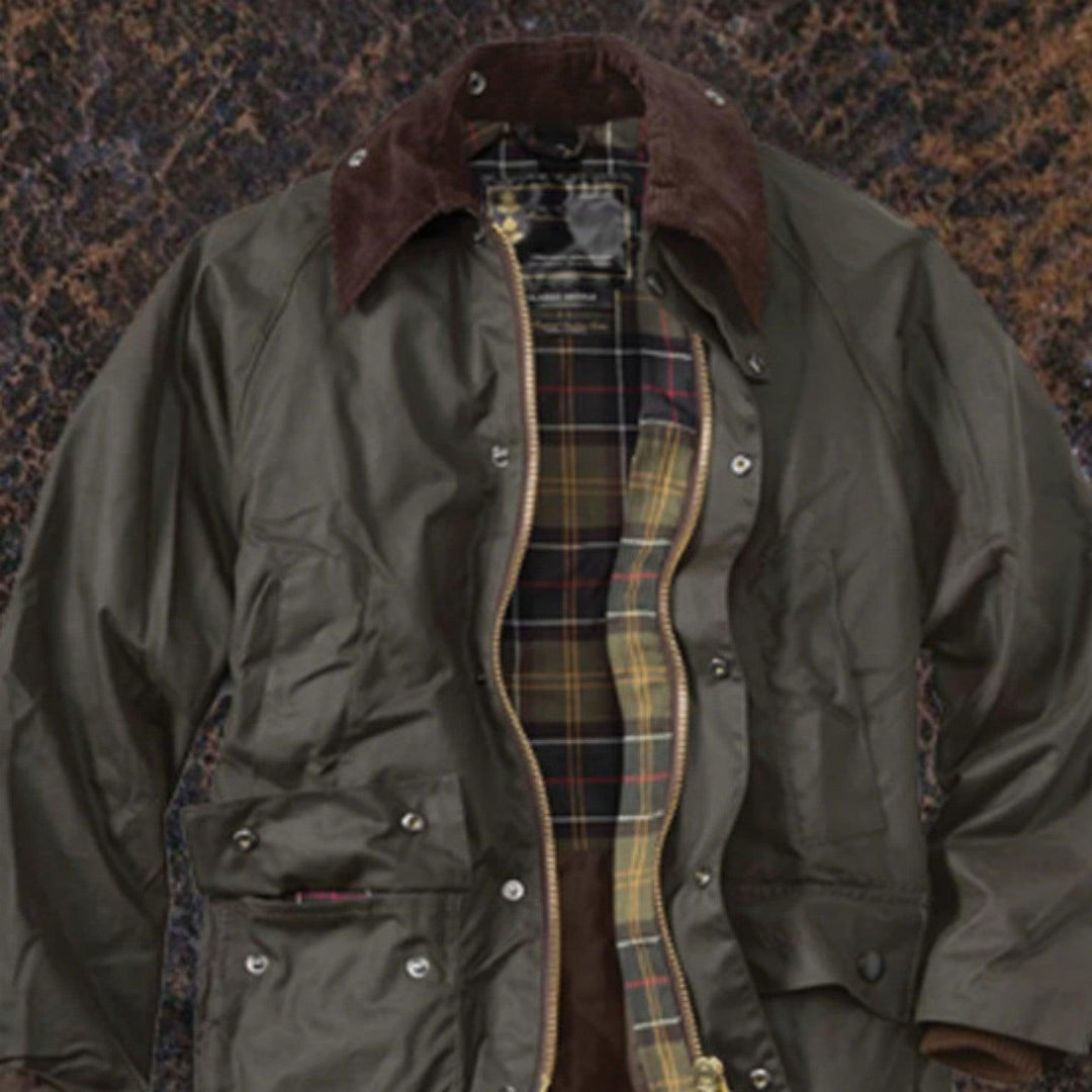 Olive field jacket with brown corduroy collar, plaid lining, and multiple front pockets