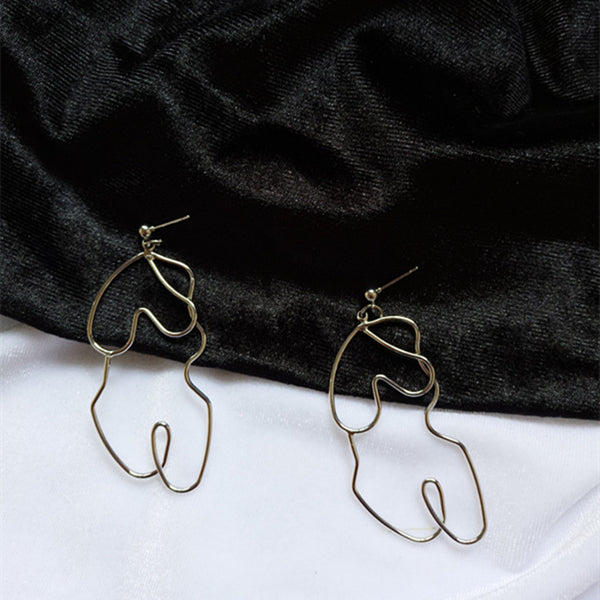 Exaggerated twisted body earrings - WOMONA.COM