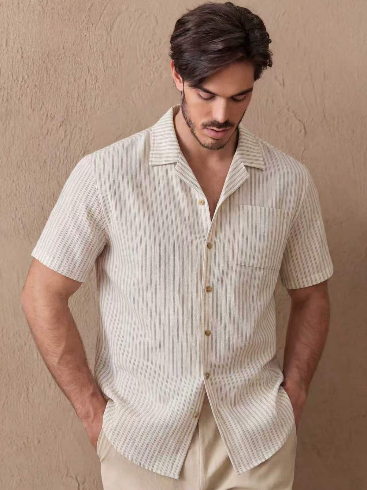 Men's beige short-sleeve pinstriped button-up shirt with spread collar