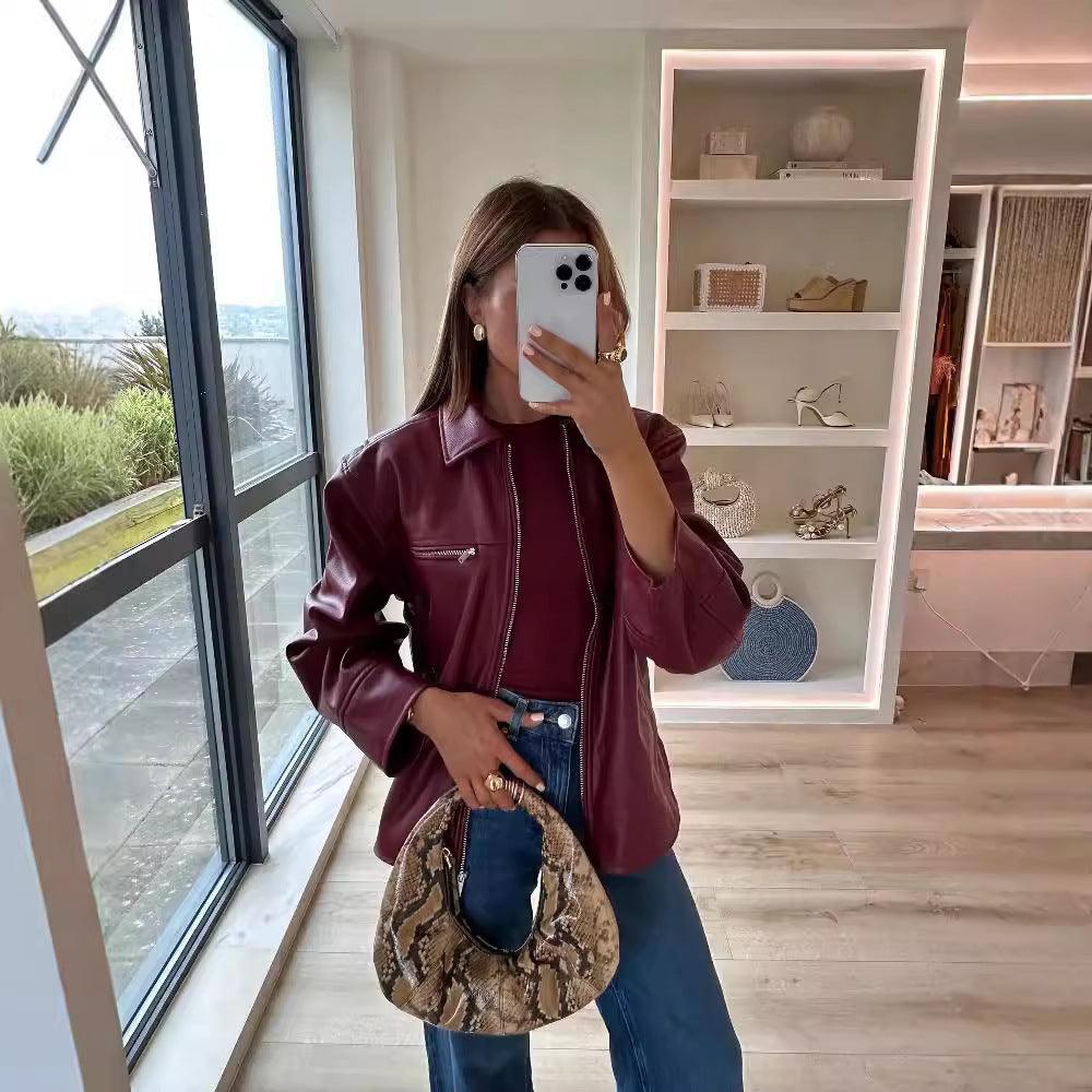 Wine red women's leather jacket with lapel collar and front zipper, long sleeves