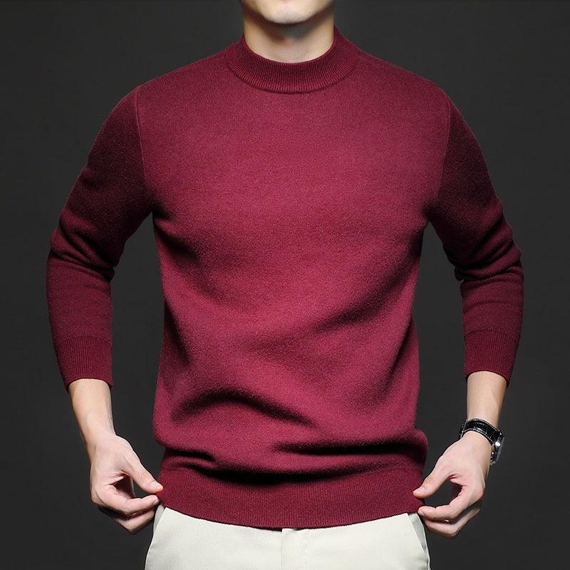 Men's crewneck knit sweater in deep red, long sleeves with ribbed cuffs and hem.