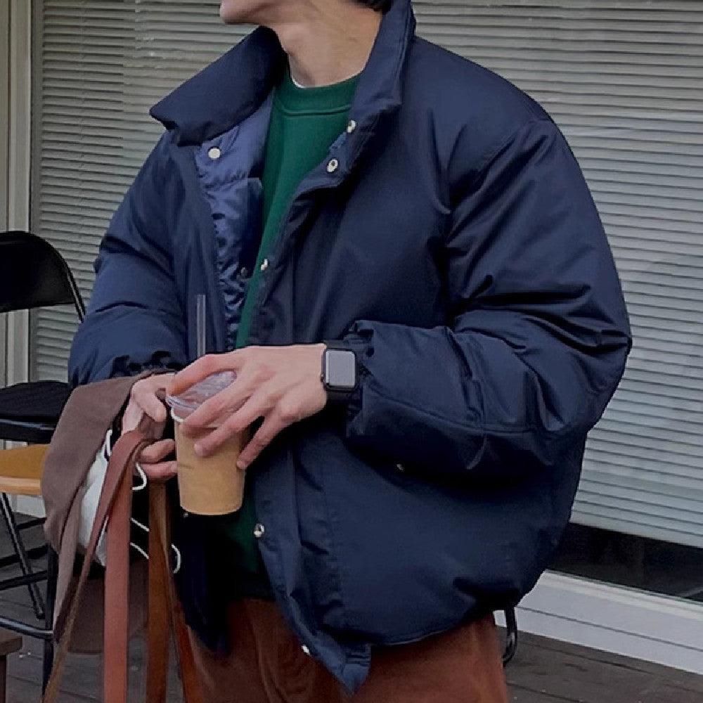 Dark blue padded stand-collar cotton coat with button front and chest pockets