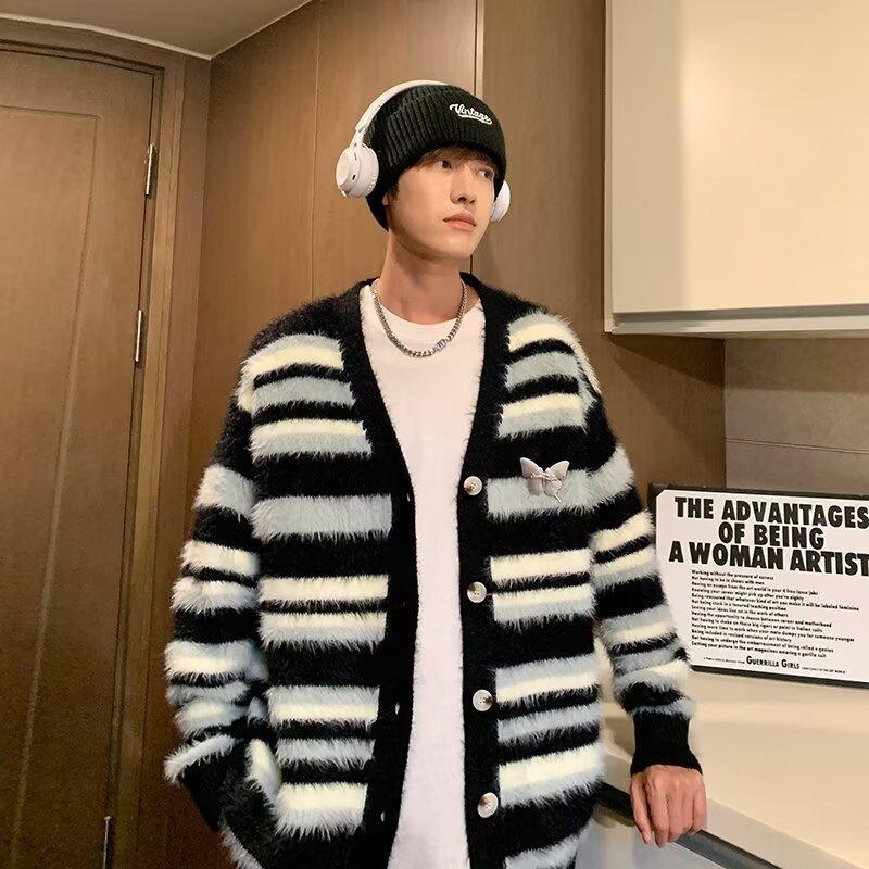 Men's black-and-white striped fuzzy cardigan sweater with button front and chest pocket