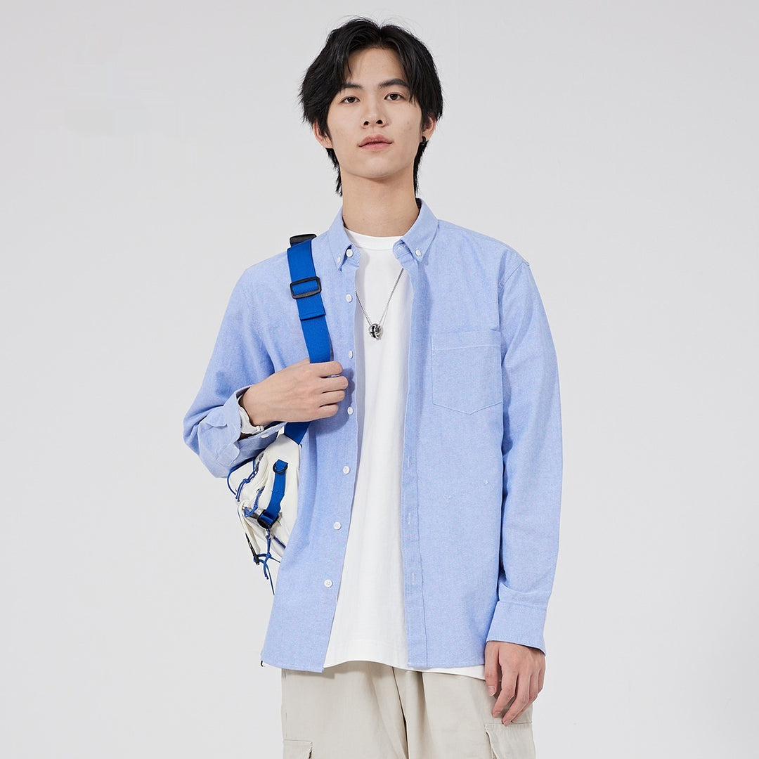 Light blue men’s long-sleeve shirt jacket, button-front with chest pockets and collar