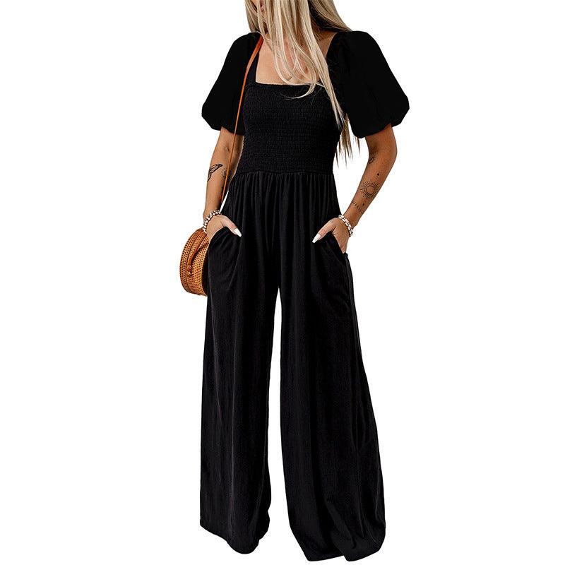 Black square-neck short-sleeve jumpsuit with smocked bodice and wide-leg pants