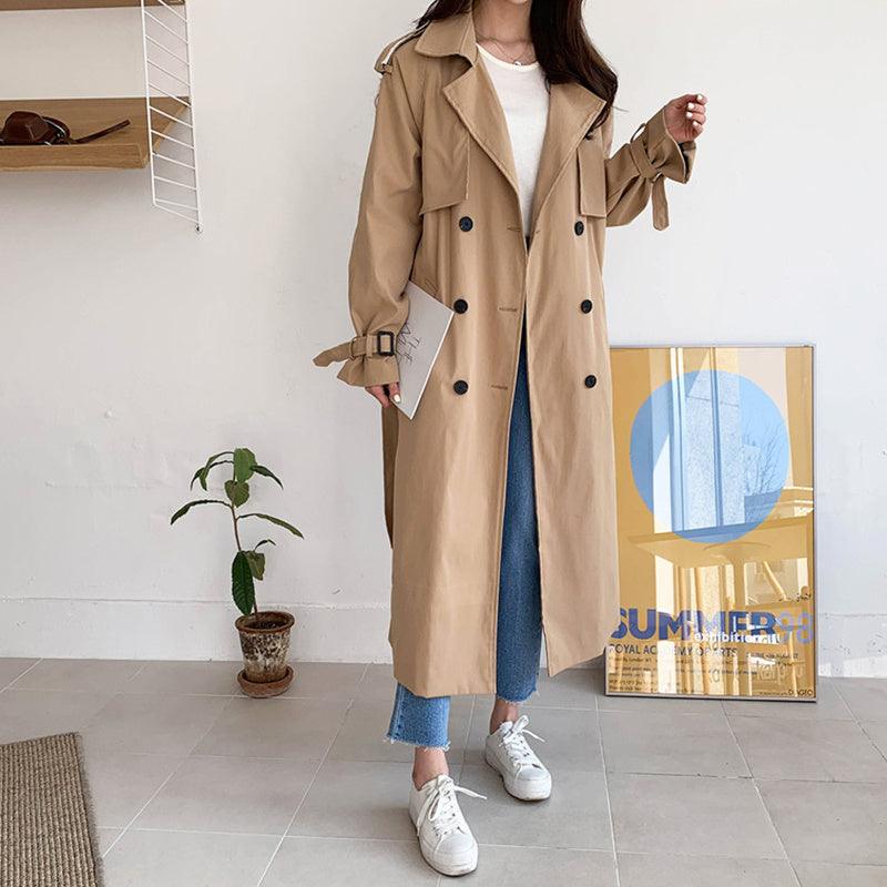 Women’s tan long windbreaker coat with hood, button front, and tied waist