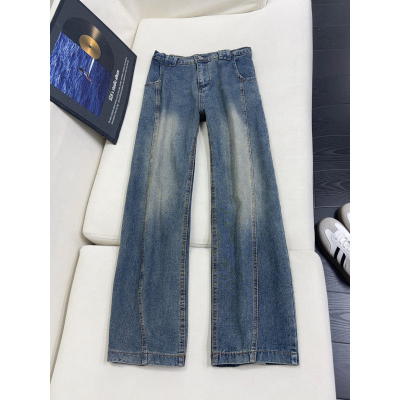 Light blue wide-leg jeans with curved seam and worn wash