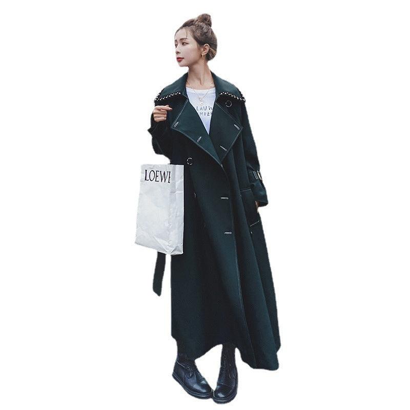 Hepburn-style long coat in dark green-black with stud-trim collar, button front, and belt
