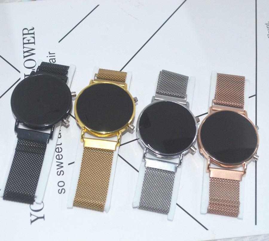 Four stainless steel LED digital watches with mesh bands in dark, gold, silver, and rose tones