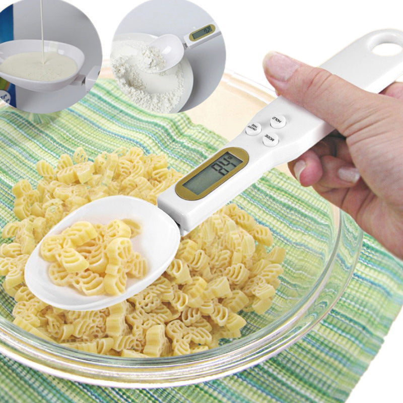 White digital measuring spoon scale with LCD screen and spoon bowl for food weighing