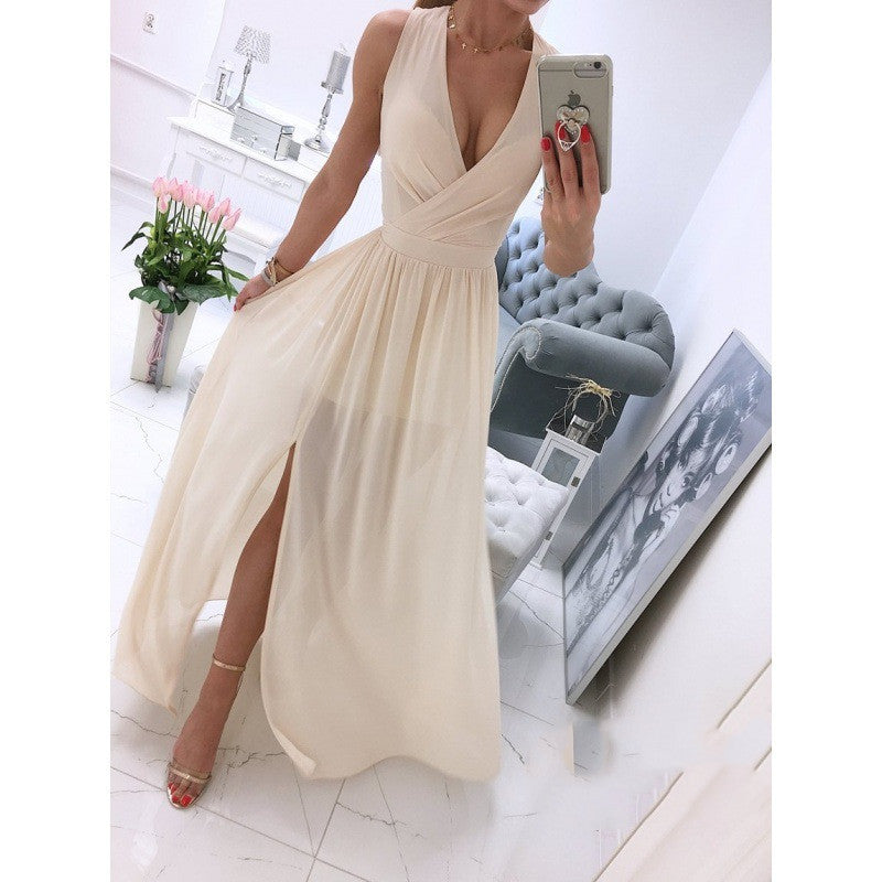 Beige sleeveless V-neck maxi dress with draped bodice, gathered waist, and front slit
